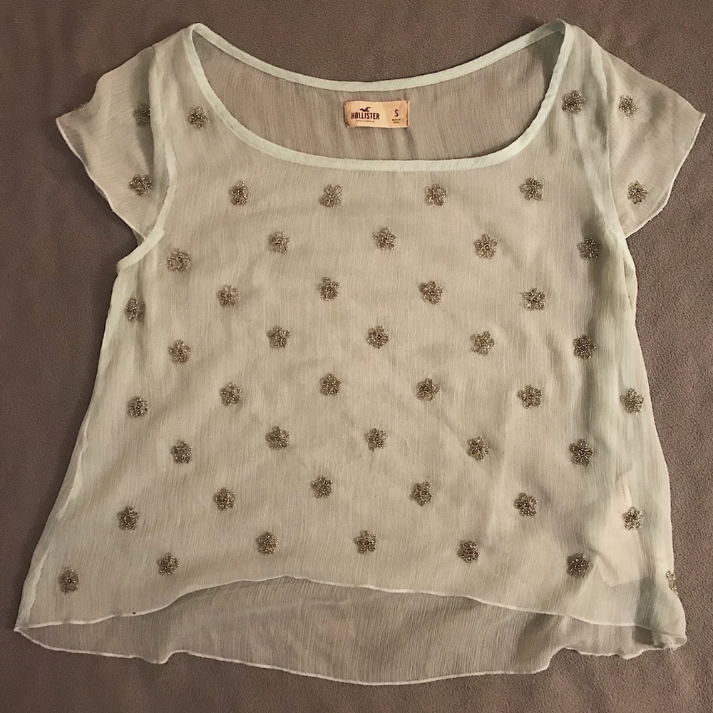 Hollister light blue blouse with bedazzled flowers